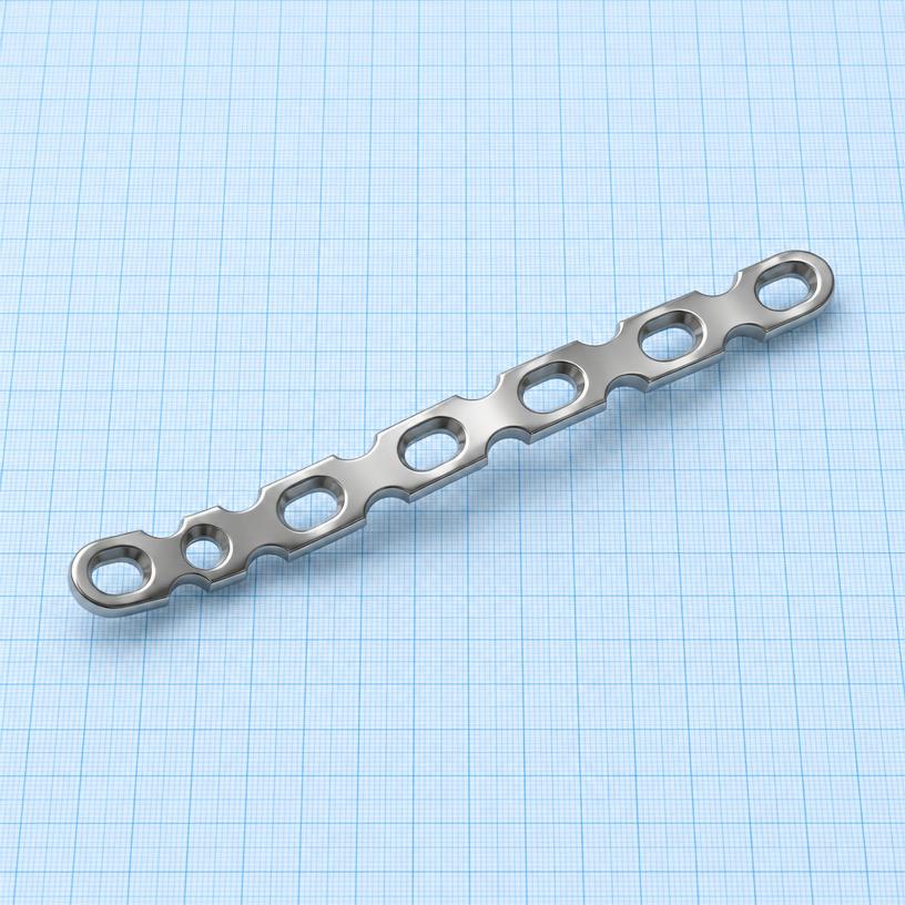Reconstruction Plate: orthopaedic implant on a light-blue graph-paper background